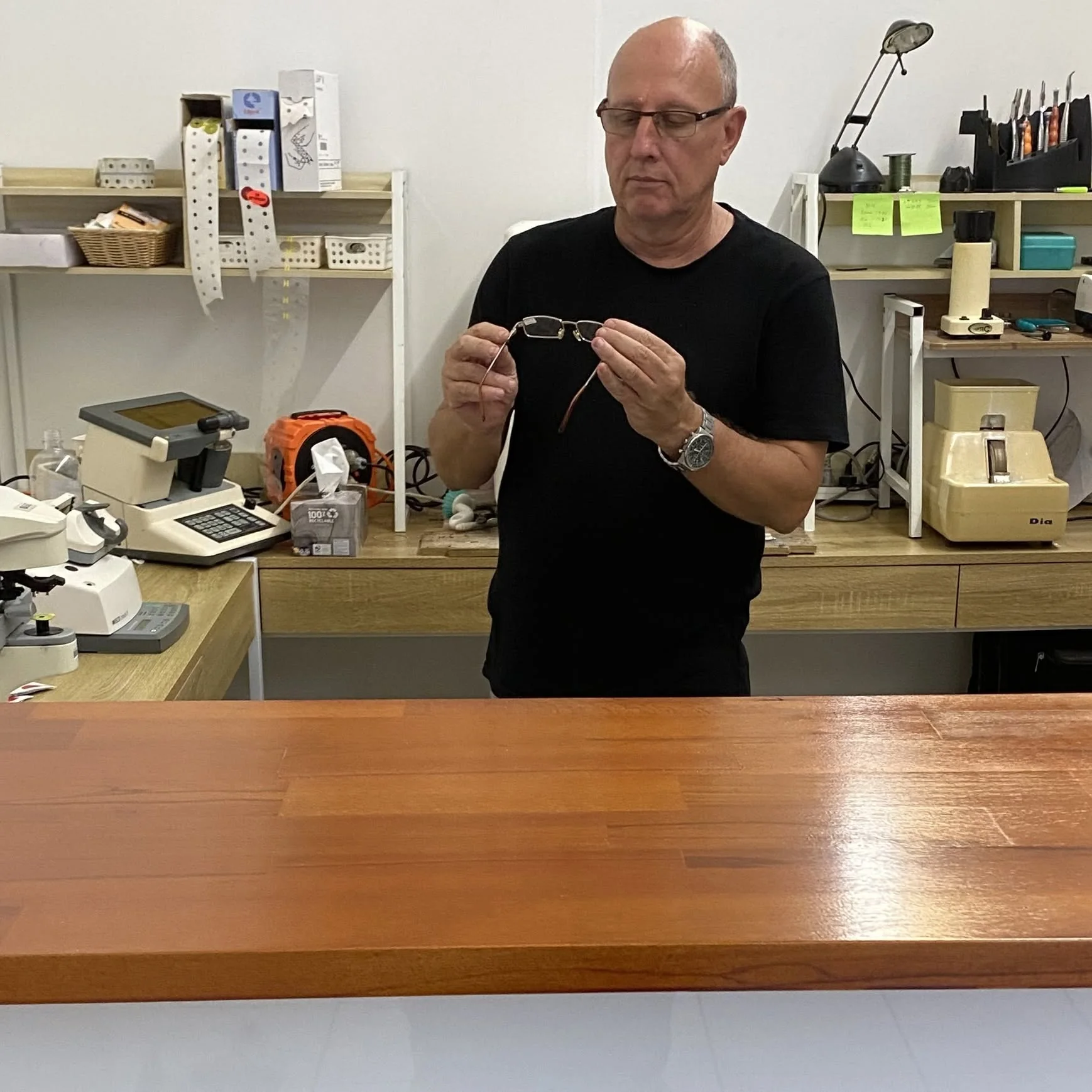 Glasses Fix optical mechanic working in the Innisfail workshop